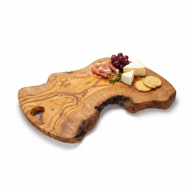 Natural olive wood serving board with cheese and charcuterie
