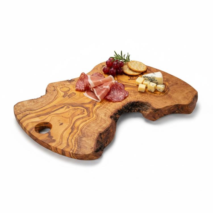 Irregular shape olive wood chopping board used for serving charcuterie